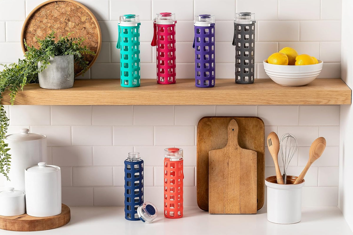 Ello Syndicate 20oz Reusable Glass Water Bottle with One-Touch Leak Proof Flip Lid and Protective Non-Slip Silicone Sleeve and Carry Loop for Coffee, Tea and Water, BPA-free, Dishwasher Safe, Pink